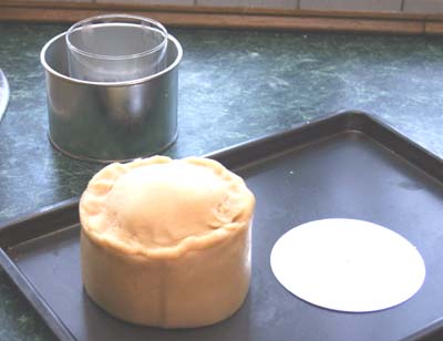 Pie released from bottom of tin